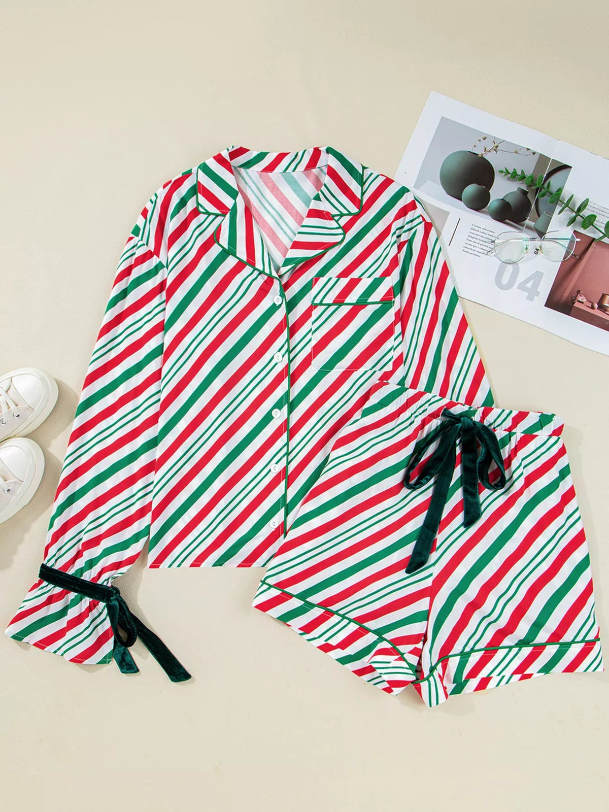 Wicked Thread Society two-piece Christmas pajama set in red, green, and white diagonal stripes with velvet ribbon ties.