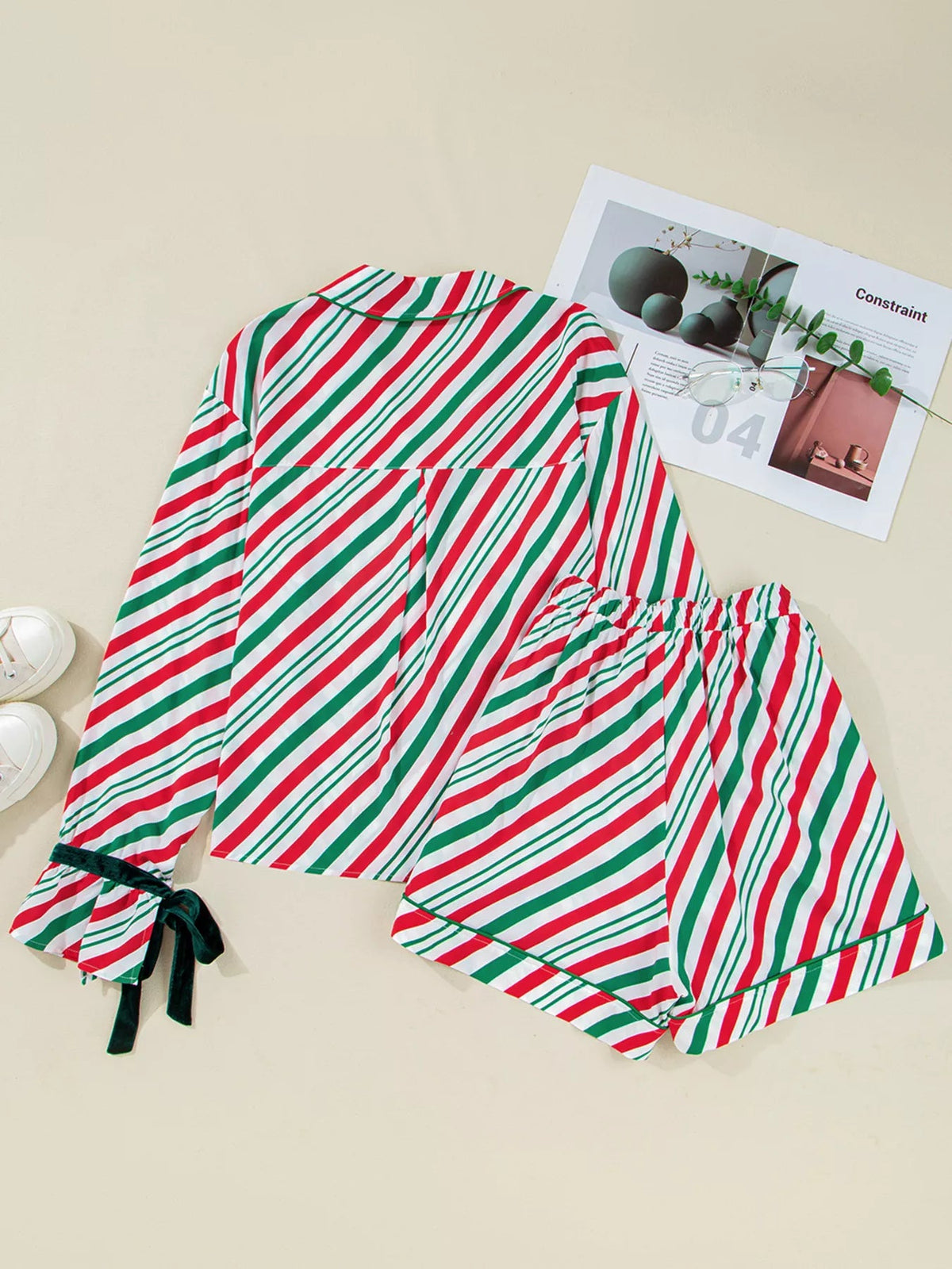 Wicked Thread Society two-piece Christmas pajama set with red and green diagonal stripes and velvet ribbon cuffs.