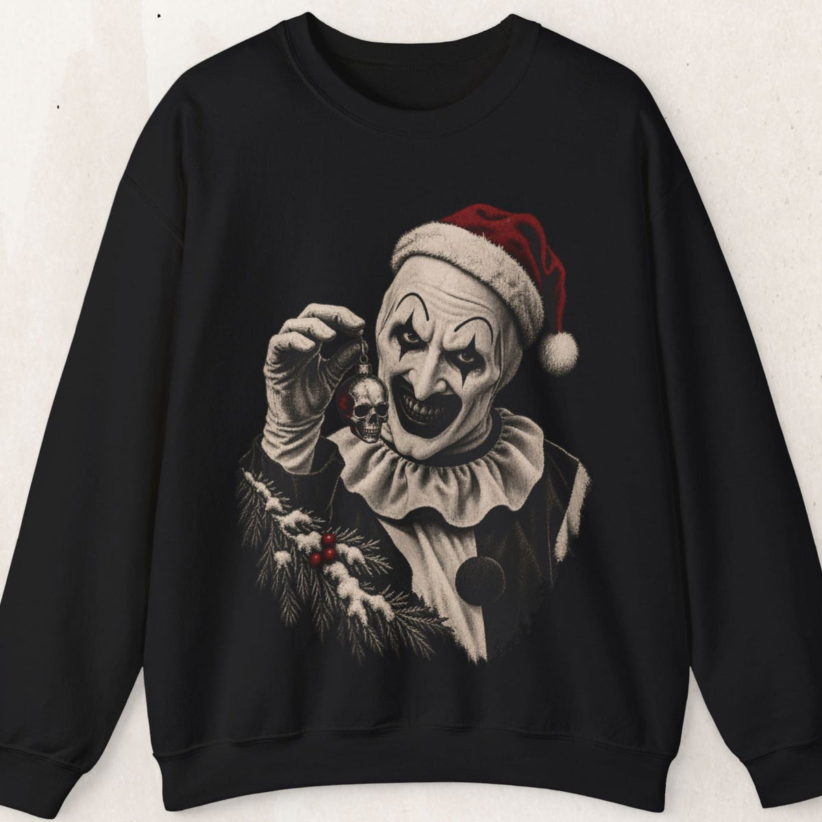Wicked Thread Society black crewneck sweatshirt featuring Art the Clown in a Santa hat holding a skull ornament.