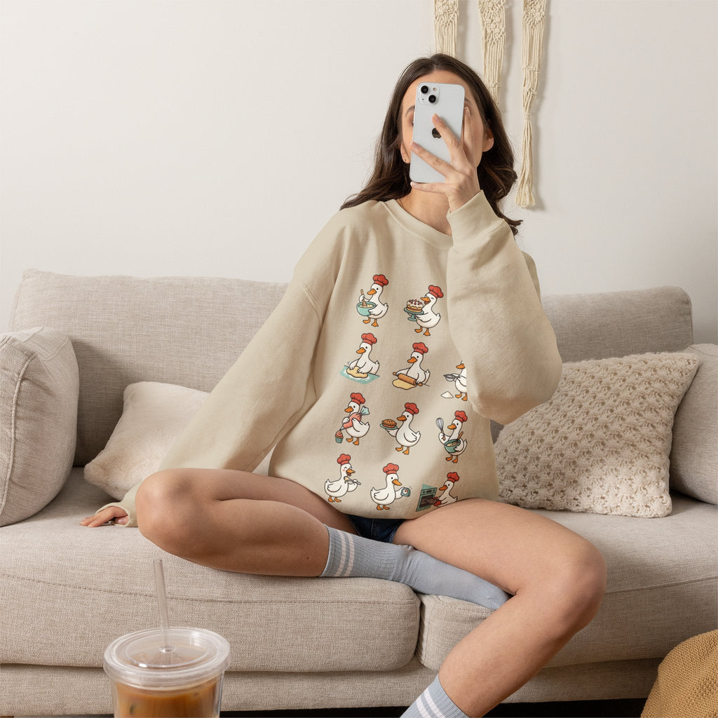 Wicked Thread Society beige crewneck sweatshirt featuring a whimsical print of geese baking for Thanksgiving.