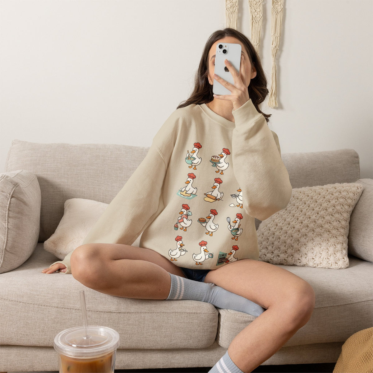 Wicked Thread Society beige crewneck sweatshirt featuring a whimsical print of geese baking for Thanksgiving.