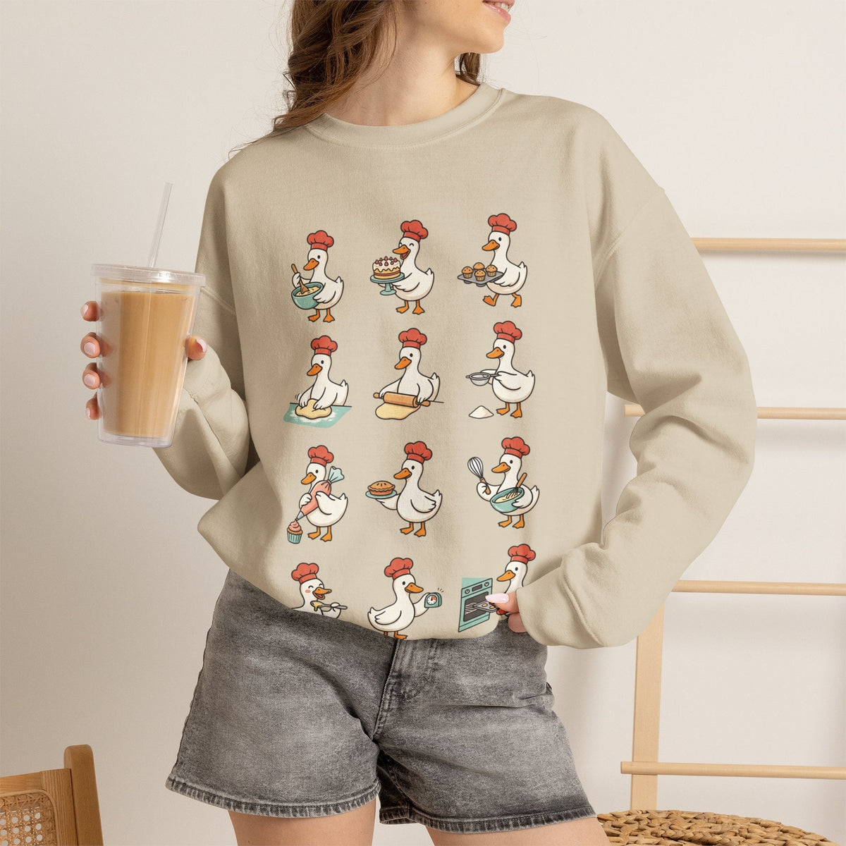 Wicked Thread Society beige crewneck sweatshirt featuring a whimsical print of geese baking in chef hats.