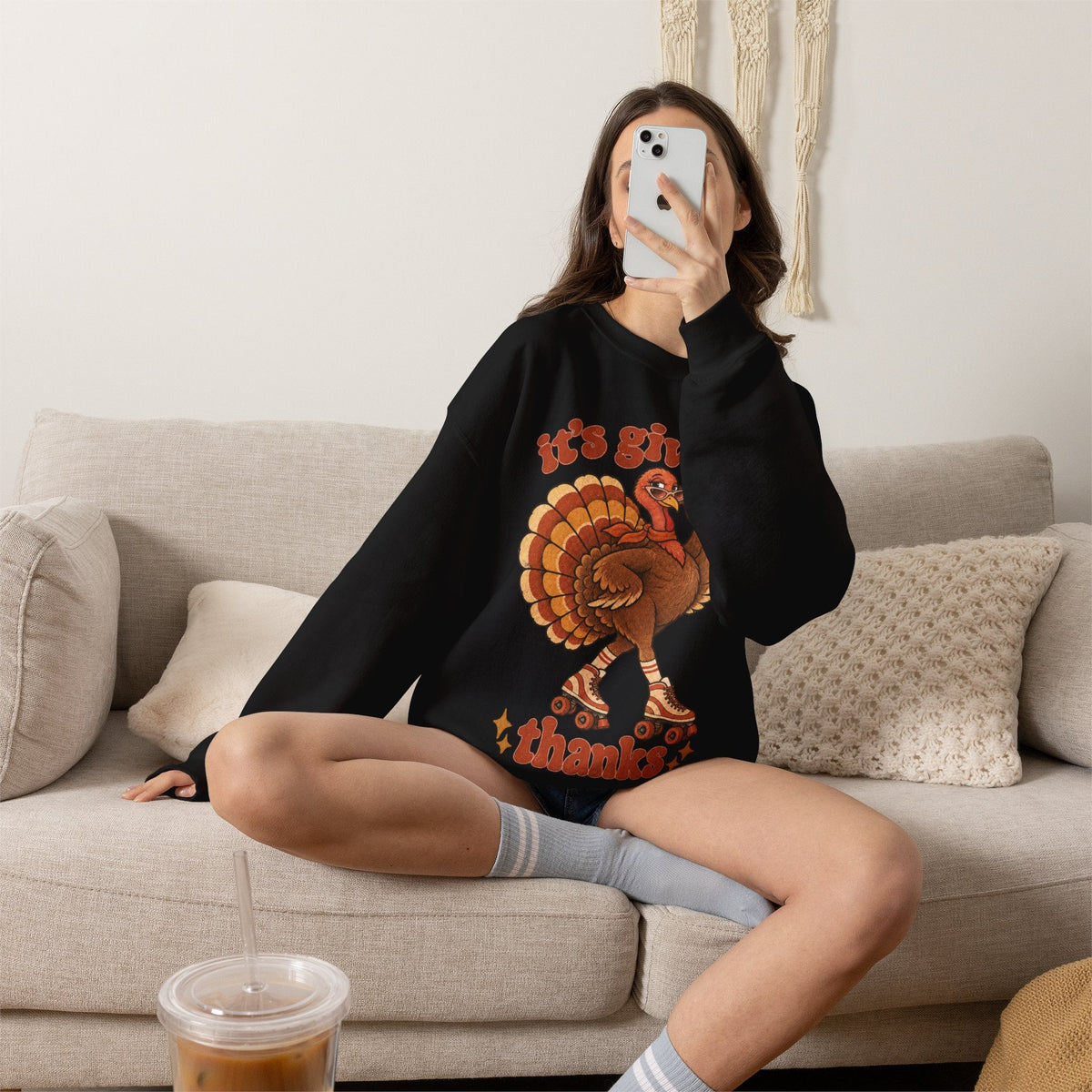 Wicked Thread Society black crewneck sweatshirt featuring a retro roller-skating turkey graphic for Thanksgiving.
