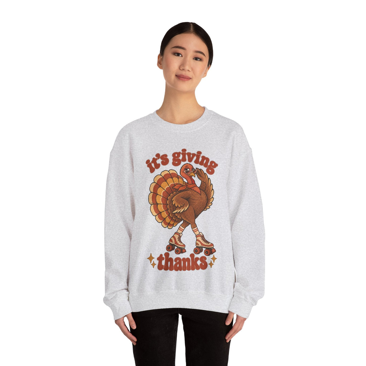 Wicked Thread Society grey crewneck sweatshirt featuring a retro roller-skating turkey graphic for Thanksgiving.