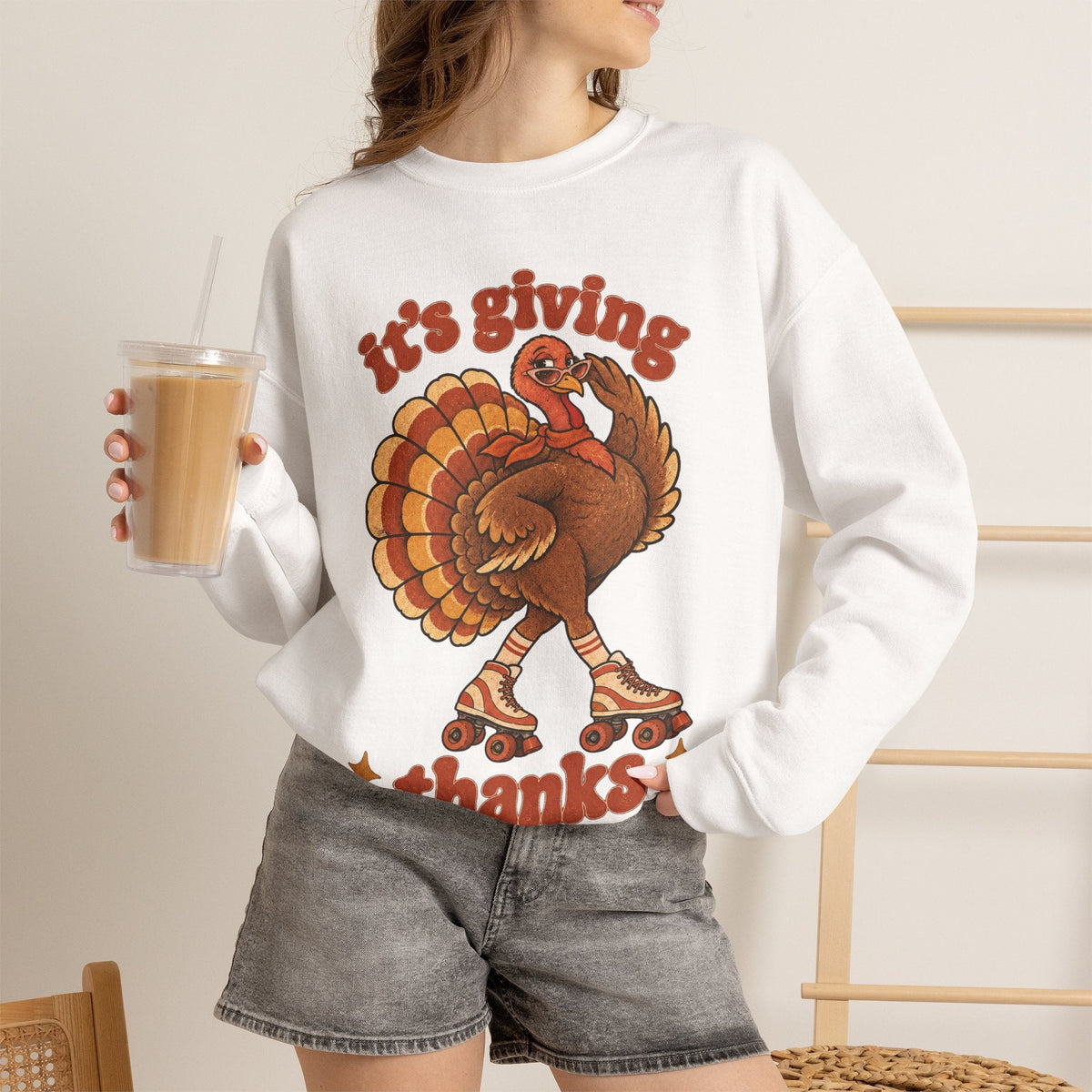 Wicked Thread Society white crewneck sweatshirt featuring a retro roller-skating turkey graphic for Thanksgiving.