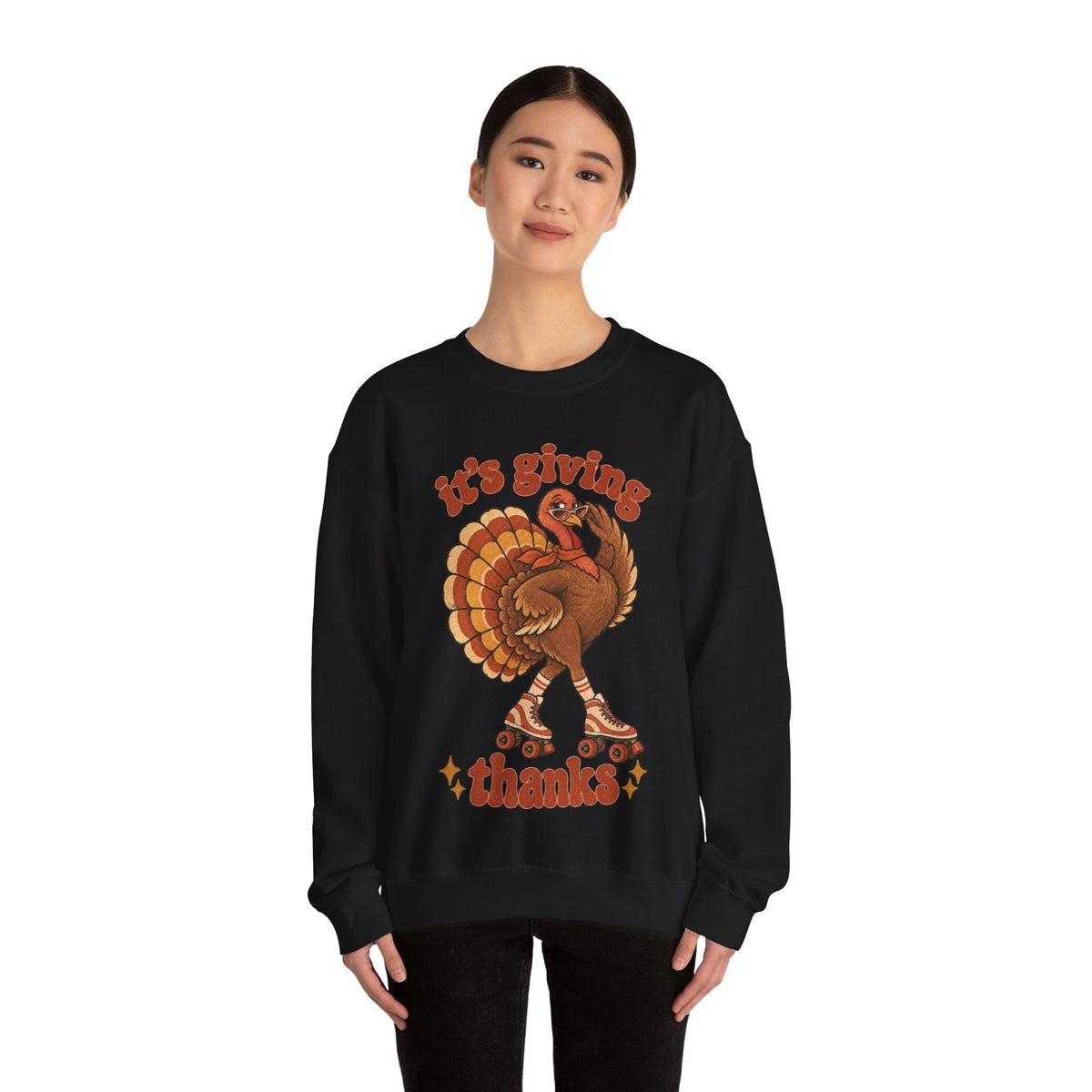 Wicked Thread Society black crewneck sweatshirt featuring a retro roller-skating turkey graphic for Thanksgiving.