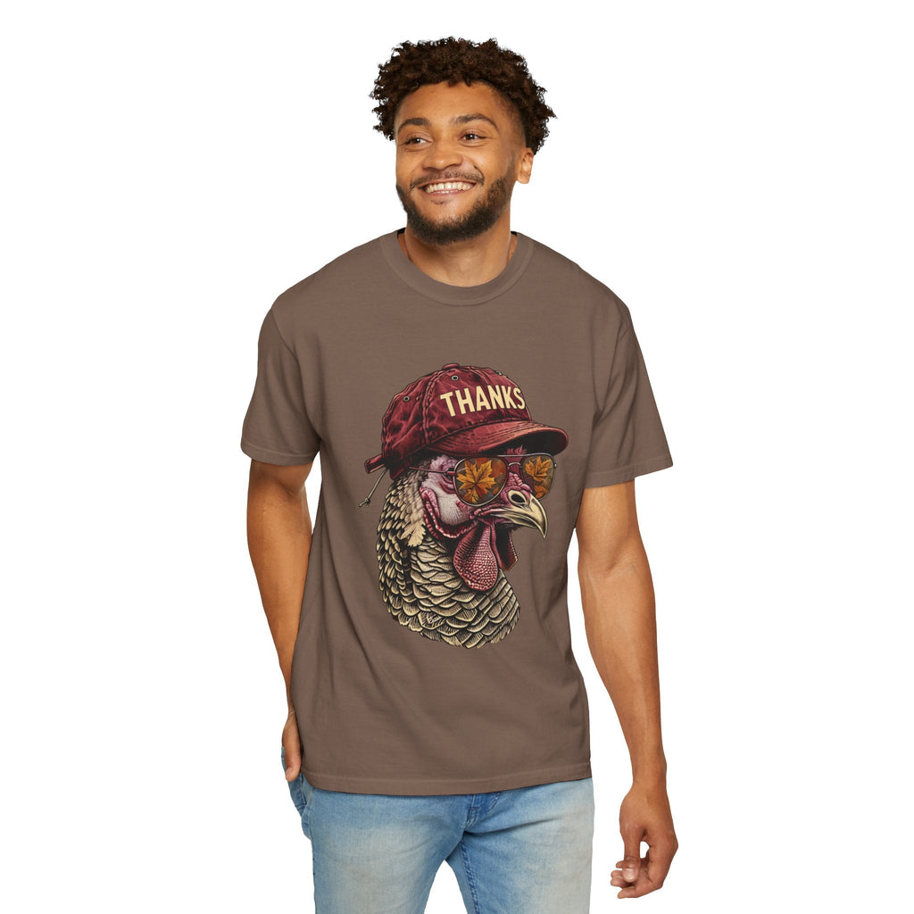 Wicked Thread Society brown t-shirt featuring a turkey wearing a red baseball cap and sunglasses with autumn leaves.