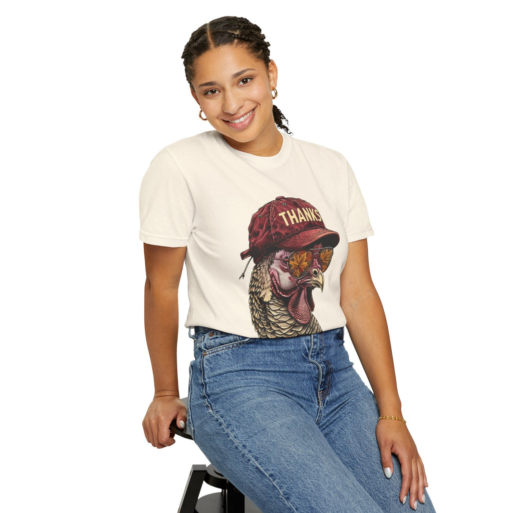 Wicked Thread Society cream t-shirt featuring a turkey wearing a baseball cap and sunglasses on a smiling woman