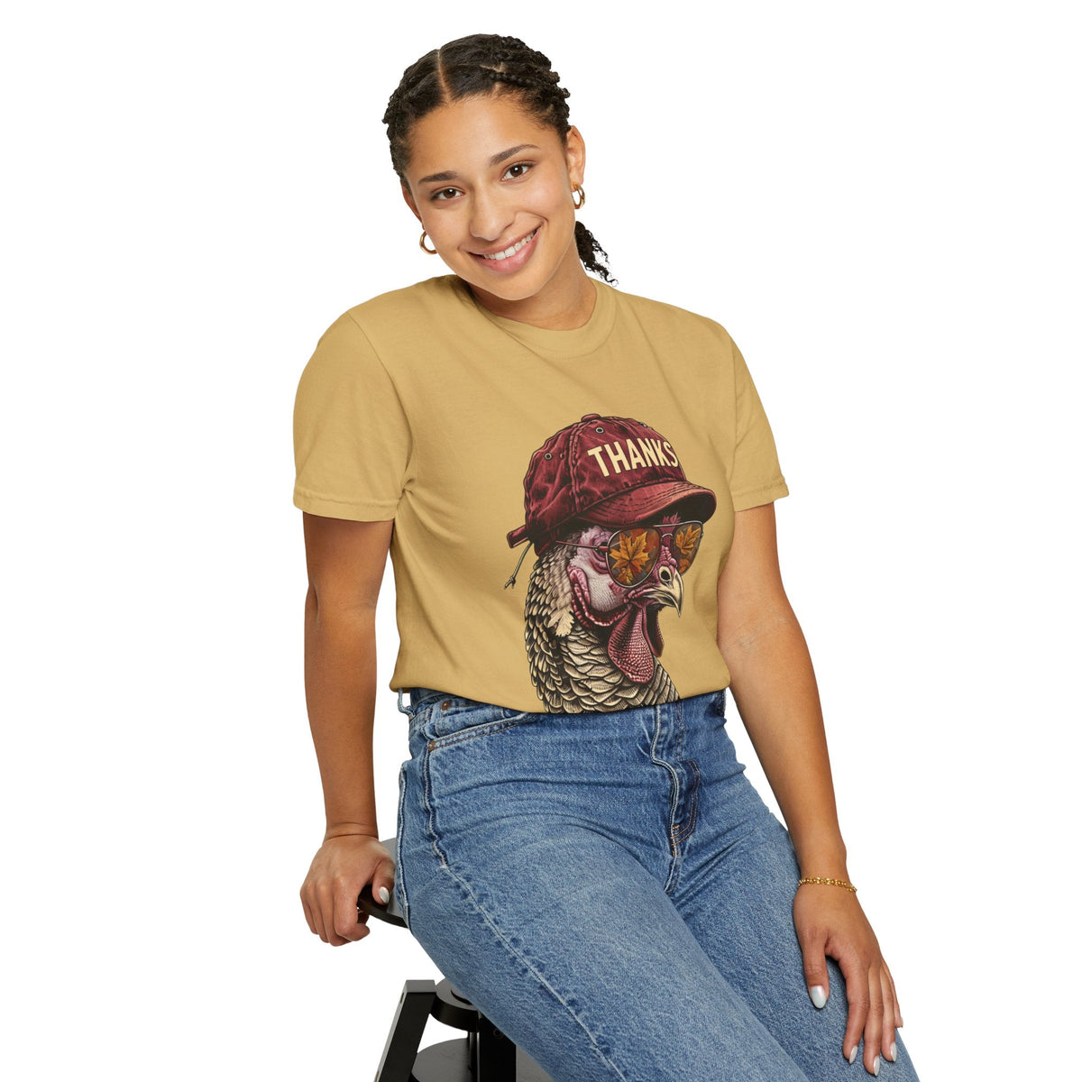 Wicked Thread Society tan t-shirt featuring a graphic of a turkey wearing a red baseball cap and sunglasses