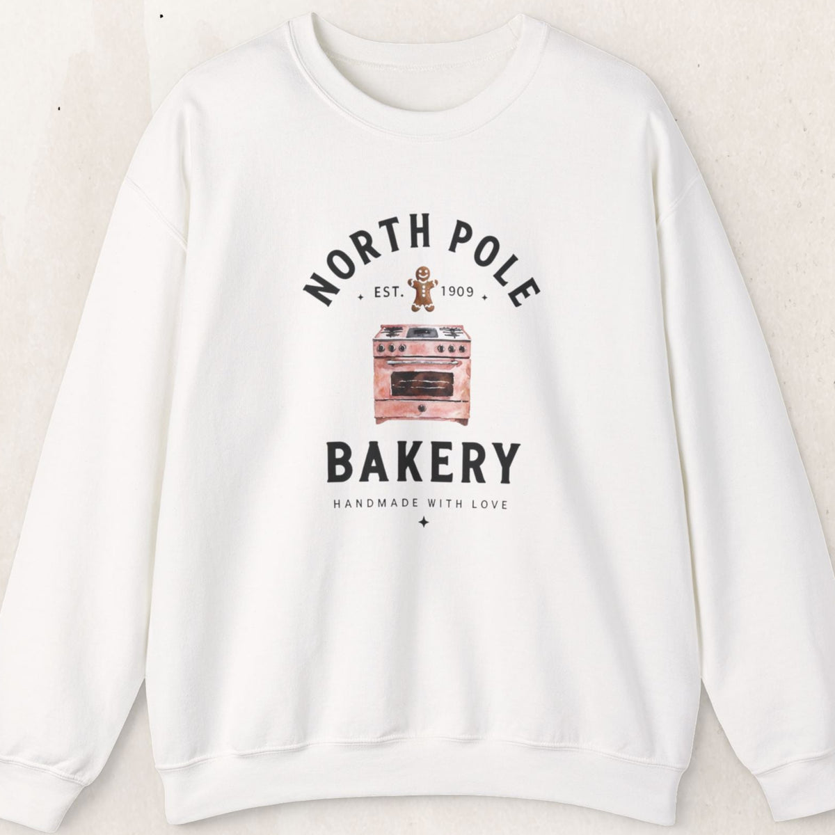 Wicked Thread Society white crewneck sweatshirt featuring a vintage North Pole Bakery oven and gingerbread man graphic
