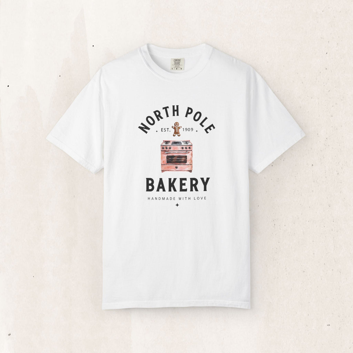 Wicked Thread Society white heavyweight cotton t-shirt featuring a vintage North Pole Bakery oven graphic.