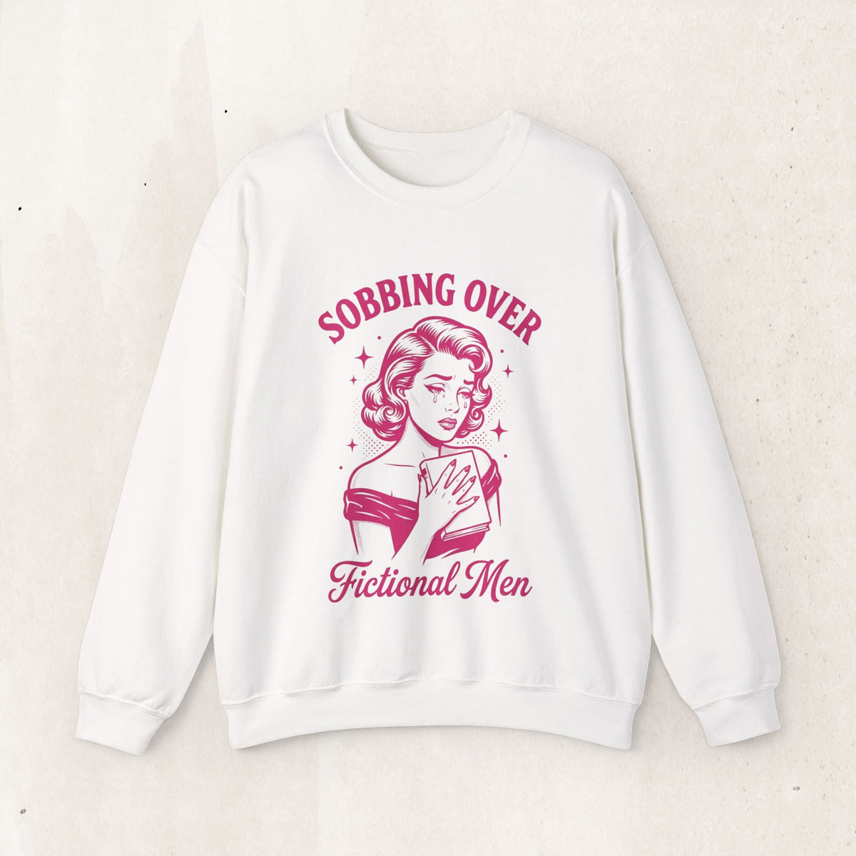Wicked Thread Society white crewneck sweatshirt with a retro pink graphic of a crying woman holding a book.