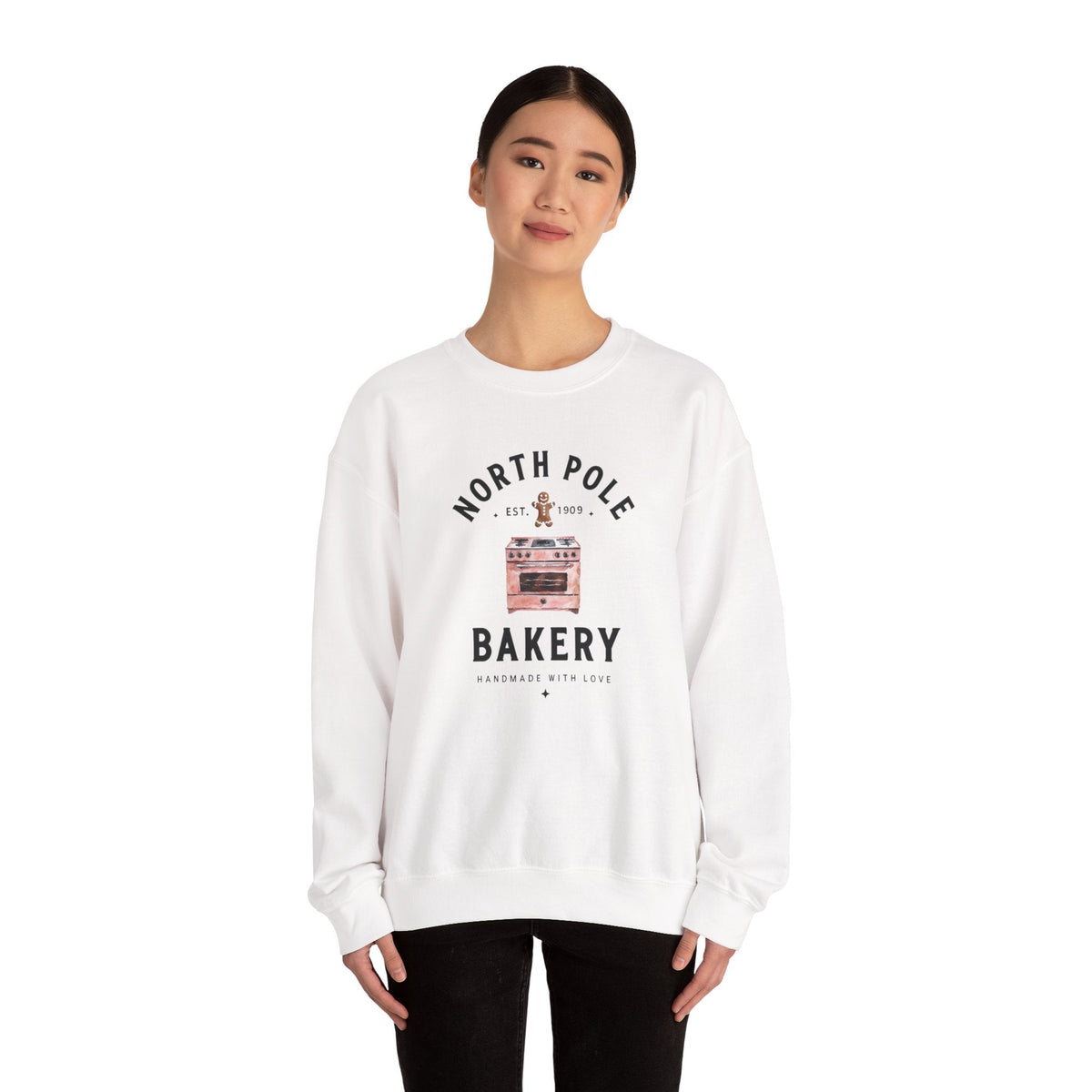 Wicked Thread Society white crewneck sweatshirt featuring a vintage North Pole Bakery oven and gingerbread man graphic