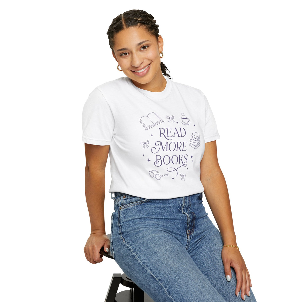 Wicked Thread Society white cotton graphic tee with Read More Books illustration worn by a smiling woman in jeans