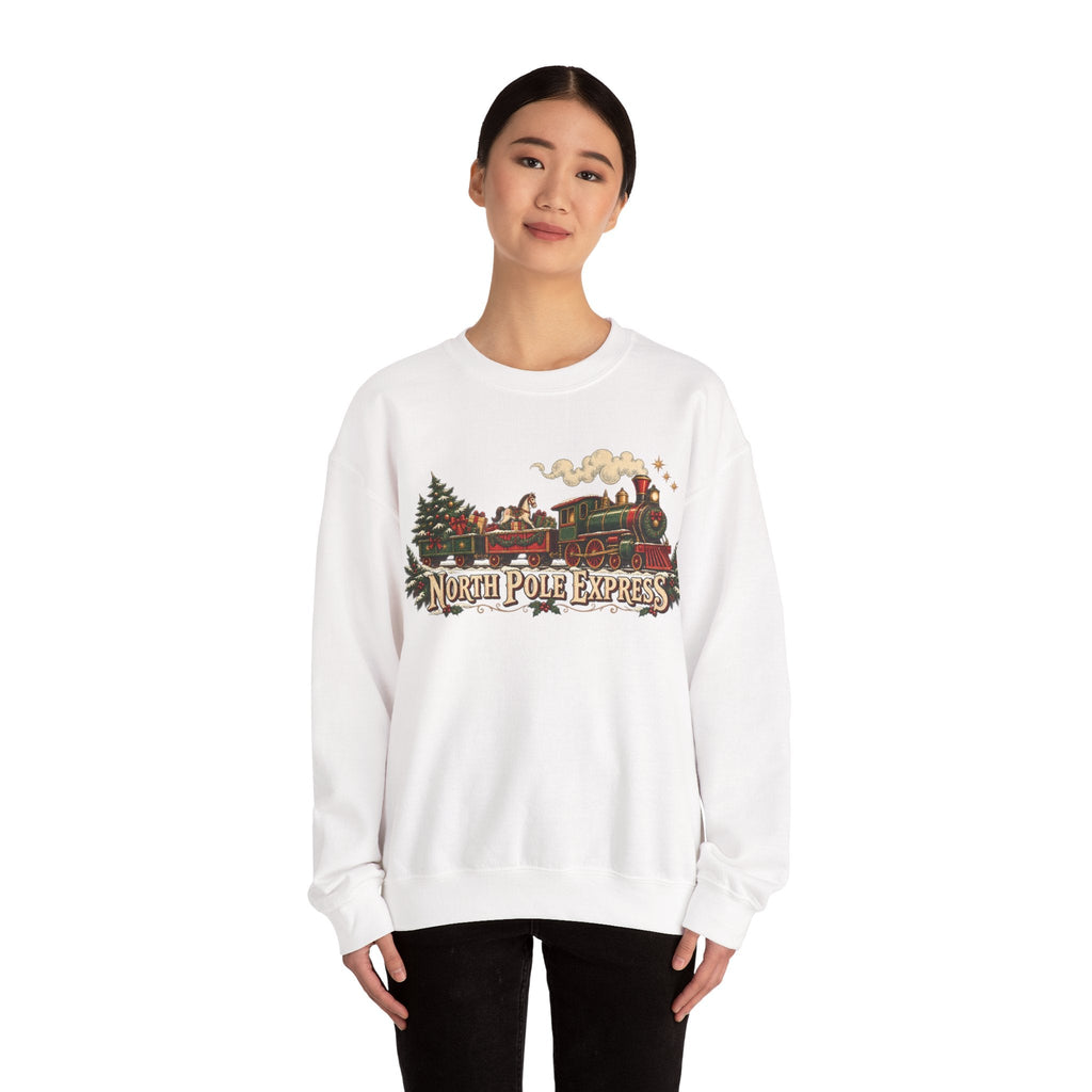 Wicked Thread Society white crewneck sweatshirt featuring a vintage North Pole Express steam train holiday graphic.