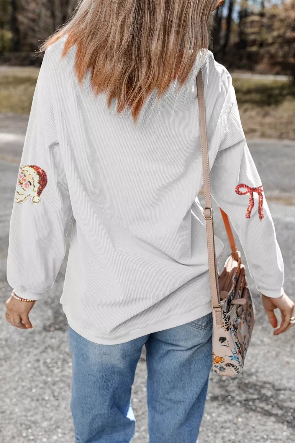 Wicked Thread Society white corded rib sweatshirt with sequin Santa and bow patches on sleeves, back view