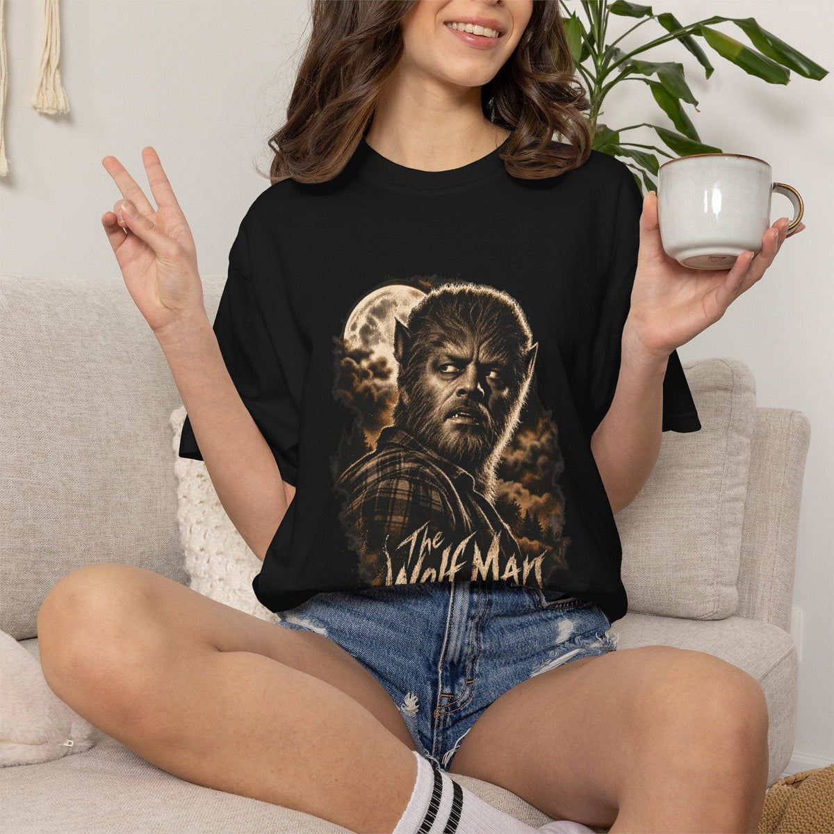 Wicked Thread Society black graphic t-shirt featuring a detailed Wolf Man print with a full moon on a woman